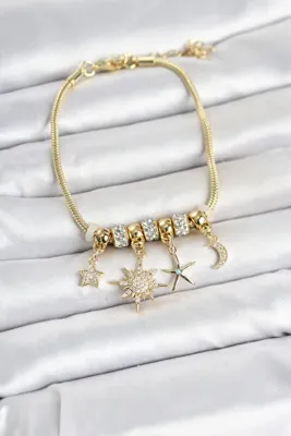 Genel Markalar Mey İthalat® Pirinç Gold Renk Kutup Yıldızı Detaylı Charmlı Kadın Bileklik