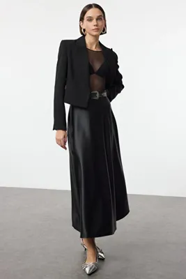 TRENDYOLMİLLA Siyah A Line/Çan Form Maxi Saten Örme Etek TWOAW25ET00111