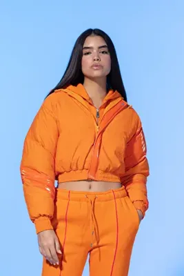 Şebnem Günay Glossy Y2K Orange Puffer Coat