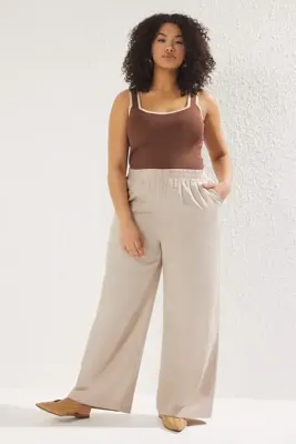 Trendyol Curve Bej Pamuk-Keten İçerikli Beli Lastikli Dokuma Büyük Beden Pantolon TBBSS25AR00015