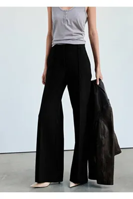 MANGO Woman Dikişli flare pantolon