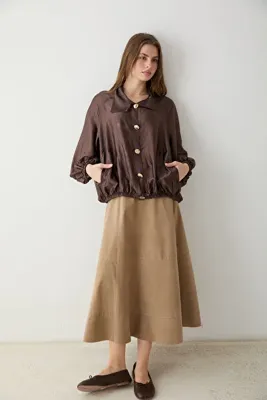 TRENDYOLMİLLA Bej Çan Kalıp Midi Süet Etek TWOAW27ET00139