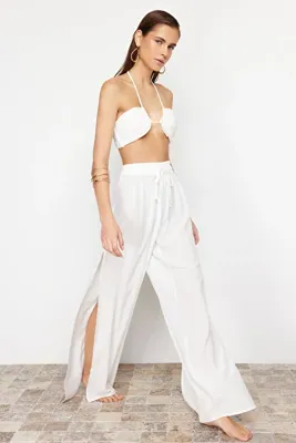 TRENDYOLMİLLA Ekru Dokuma Yırtmaçlı Maxi Plaj Yüksek Bel Pantolon TBESS24PL00013