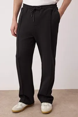 TRENDYOL MAN Siyah Straight Kalıp Geniş Paça İnterlok Rahat Pamuklu Pantolon TMNAW26PL00002