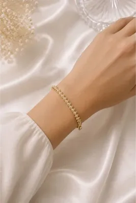 Genel Markalar Lumière d’Asel Gold Renk Piramit Detaylı Taşlı Kadın Bileklik